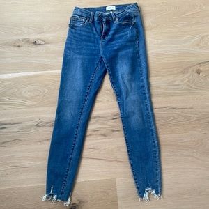 Size 26 pistola straight leg jeans. Distressed at bottom.